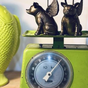 coppia di portacandele maialini con le ali